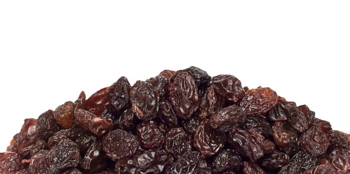 Dried raisins on a white background