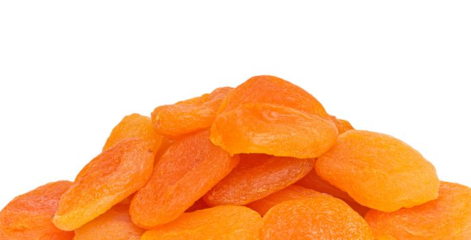 heap of dried apricots on a white background