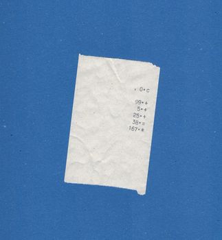 bill or receipt isolated over blue background