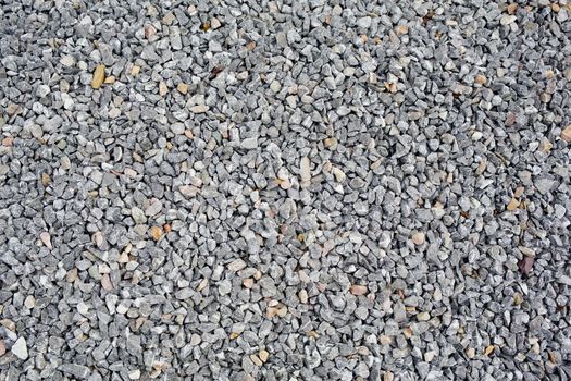 background made of a closeup of a pile of pebbles