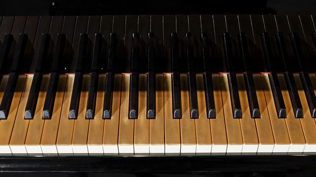 piano keys on black piano