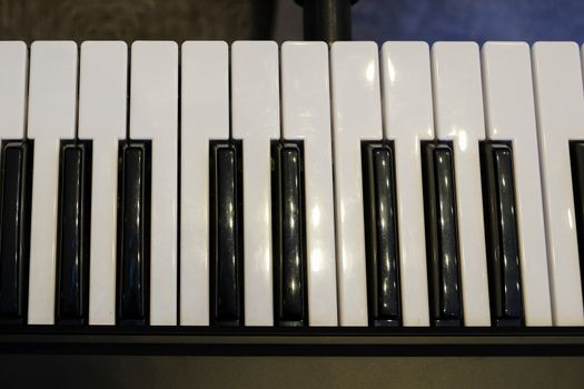 piano keys on black piano