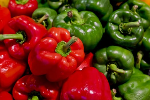 colorful bell peppers with green and red colors, natural background