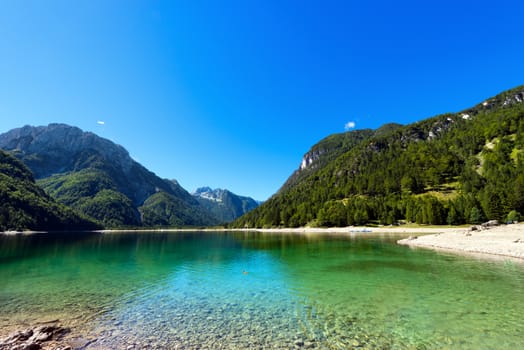 Lago del Predil (Predil Lake), beautiful alpine lake in north Italy near the Slovenian border. Julian Alps, Friuli Venezia Giulia, Italy