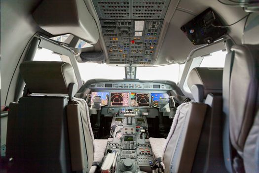 Inside view Cockpit G550 with blue sky and clouds