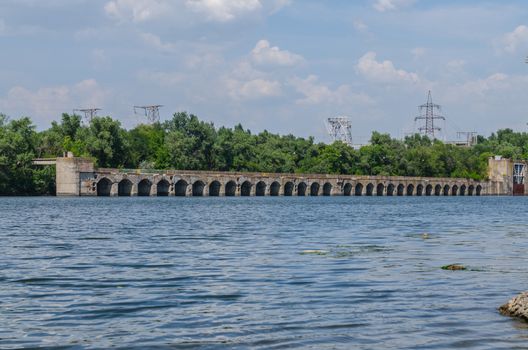 bridge hydroelectric plant on blue sky background