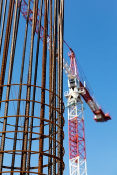 Construction site. Steel reinforcement. Building crane.