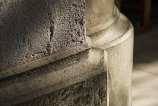 Stone pillar foot in Gothic church 
