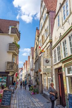 Bremen, Germany - June 6, 2014: Alley of the quarter Schnoor, an old town street in downtown Bremen, UNESCO World Heritage Site.