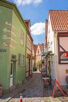 Bremen, Germany - June 6, 2014: Alley of the quarter Schnoor, an old town street in downtown Bremen, UNESCO World Heritage Site.