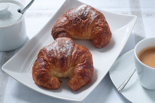 Continental breakfast with coffee , croissants and fresh fruit