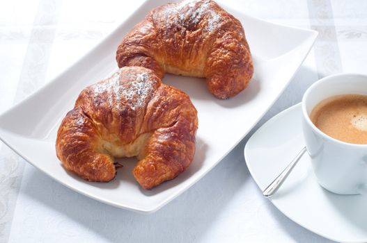 Continental breakfast with coffee , croissants and fresh fruit