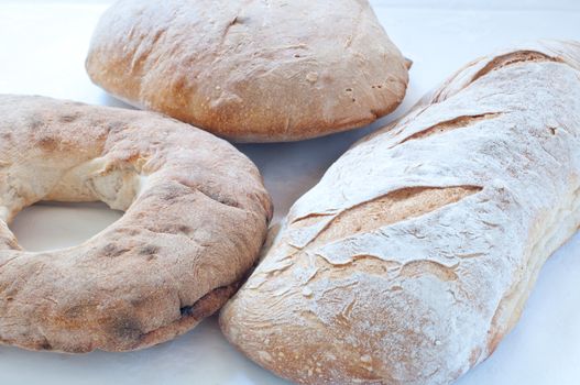 Different varieties of Italian pasta and homemade bread