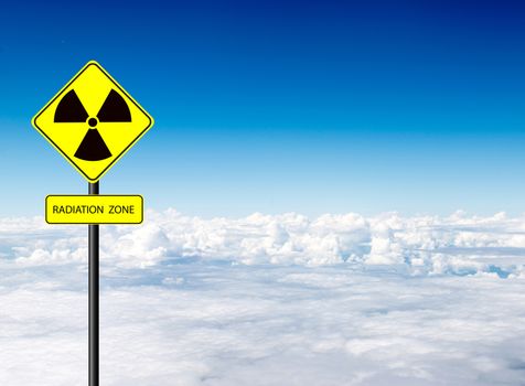 nuclear radiation warning symbol with blue sky