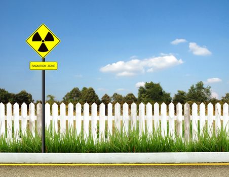 nuclear radiation warning symbol with blue sky 