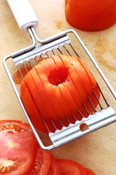 utensil for slicing tomatoes, close up