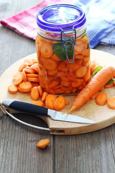 chopped carrots on a wood board, shallow dof 