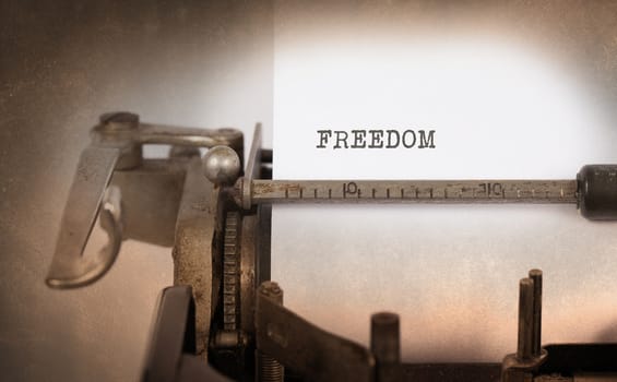 Vintage inscription made by old typewriter, Freedom