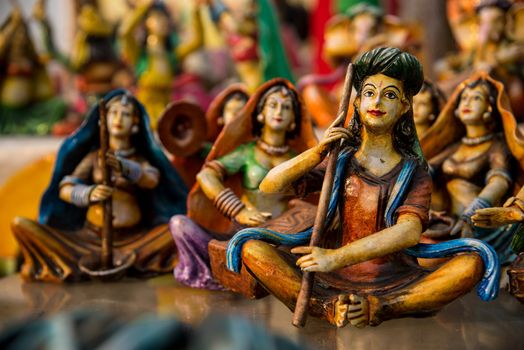 Beautiful clay dolls of miniature musicians performing in a band of classical music
