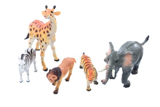 Small toy animals ioslated on a white background.