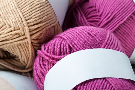 Set of colorful wool yarn balls. Closeup photo.