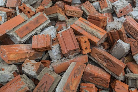 Pile of red brick, ruin after demolishing