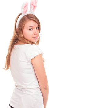 beautiful young woman wearing cute bunny ears looking a the camera