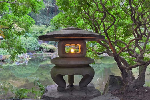 Stone Lantern by the Pond at Japanese Garden