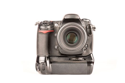 Black DSLR camera with vertical battery grip and small lens attached over white background