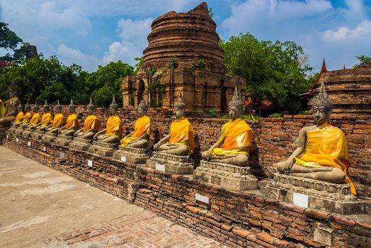 Numerous ancient buddhist statues also called Chedis in a temple in Ayutthaya.