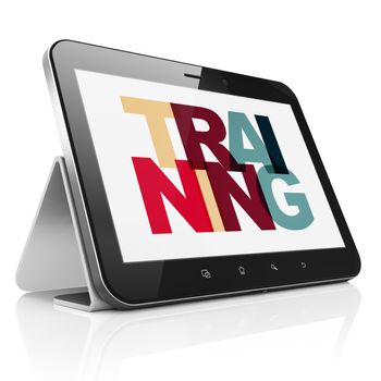 Learning concept: Tablet Computer with Painted multicolor text Training on display