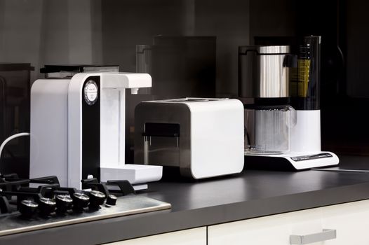 Modern luxury black and white kitchen in high tech style