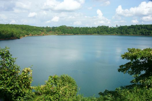 Bien Ho tourist area, ecotourism with big lake, pine forest around, green landscape, fresh air, people rowing boat on Bienho pond, Gia Lai, Vietnam