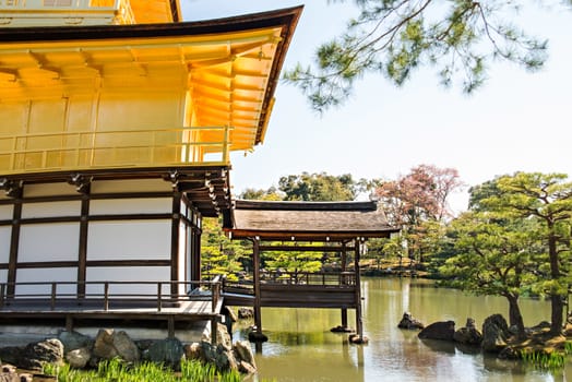 KYOTO, JAPAN - APRIL 14 2014: Old Japanese golden castle, Kinkakuji Temple (The Golden Pavilion)