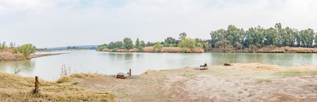 Confluence of the Gariep (Orange) and Vaal Rivers near Douglas in the Northern Cape Province of South Africa. Gariep to the left and Vaal to the right. The water levels of both rivers are very low