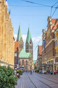 Bremen, Germany - June 6, 2014: Sankt Petri Cathedral - view from the shopping street towards marketplace