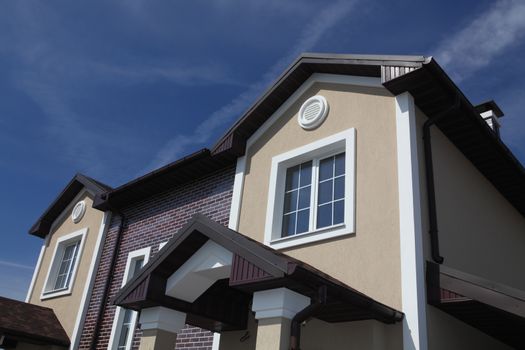 part of modern house on blue sky