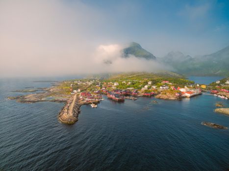 Scenic aerial view of fishing village A on Lofoten islands in Norway with traditional red fishing huts