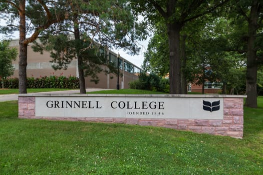 GRINNELL, IA/USA - AUGUST 8, 2015: Entrance sign on the campus of Grinell College. Grinnell College is a private liberal arts college  known for its rigorous academics and tradition of social responsibility.