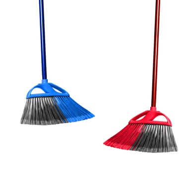 plastic blue and red brooms isolated on white background.