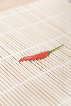 red chili peppers on mat