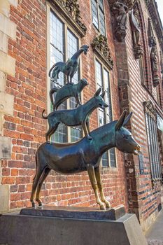 Bremen, Germany - June 6, 2014: Exterior of the statue of the Town Musicians of Bremen. Famous statue created by Gerhard Marcks in 1953.