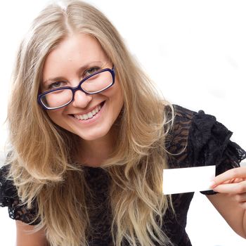 smiling young woman in dress showing a card