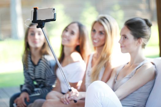 group of young women doing selfie