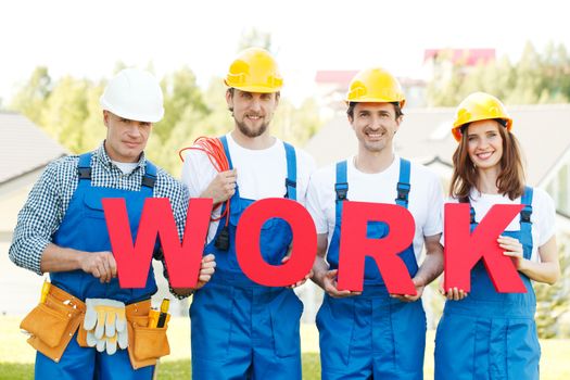 group of workmen with word work
