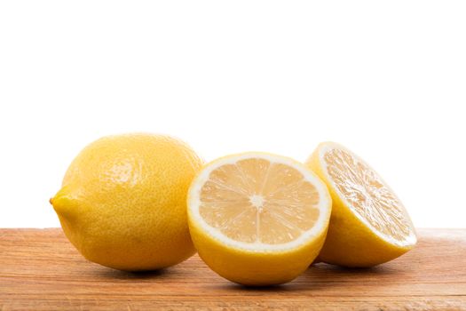 two lemons white background with shadow