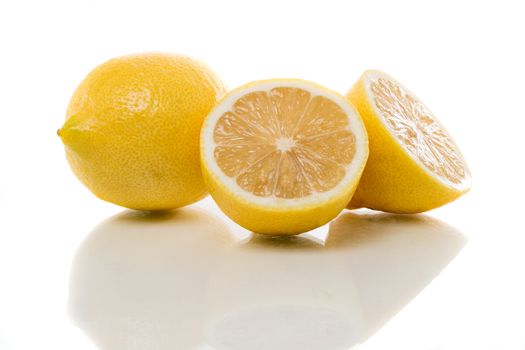 two lemons white background with shadow