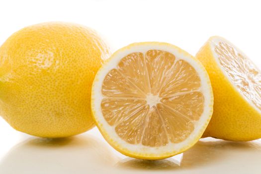 two lemons white background with shadow