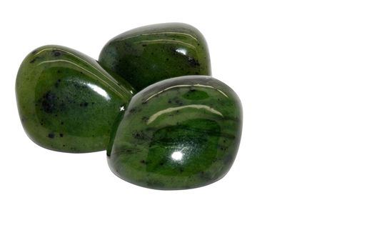 Set of a beautiful tumbled Jade semiprecious stones isolated on white