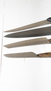 kitchen knife over white table background